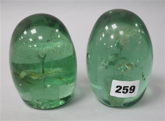 Two green glass dumps